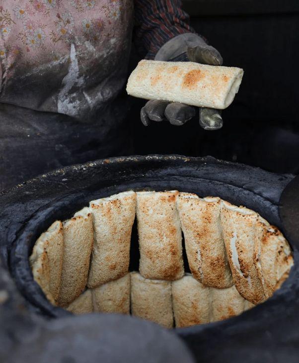 开元ky棋牌石家庄缸炉烧饼：焦脆外壳与柔